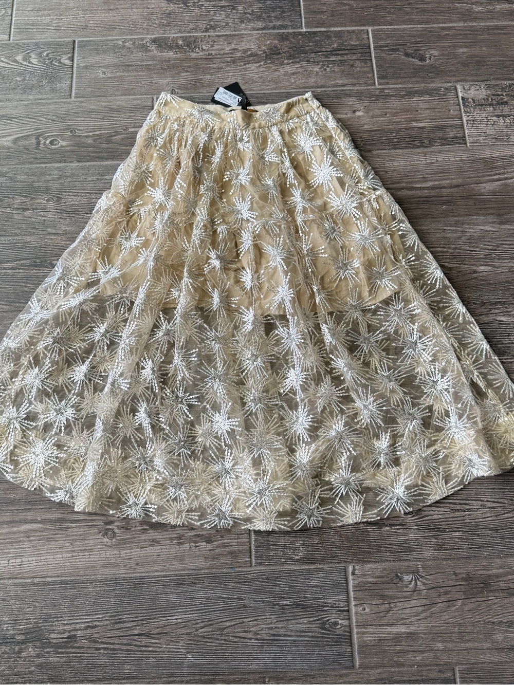 Maje Sequin cream & tan sequin midi skirt with white starburst embroidery